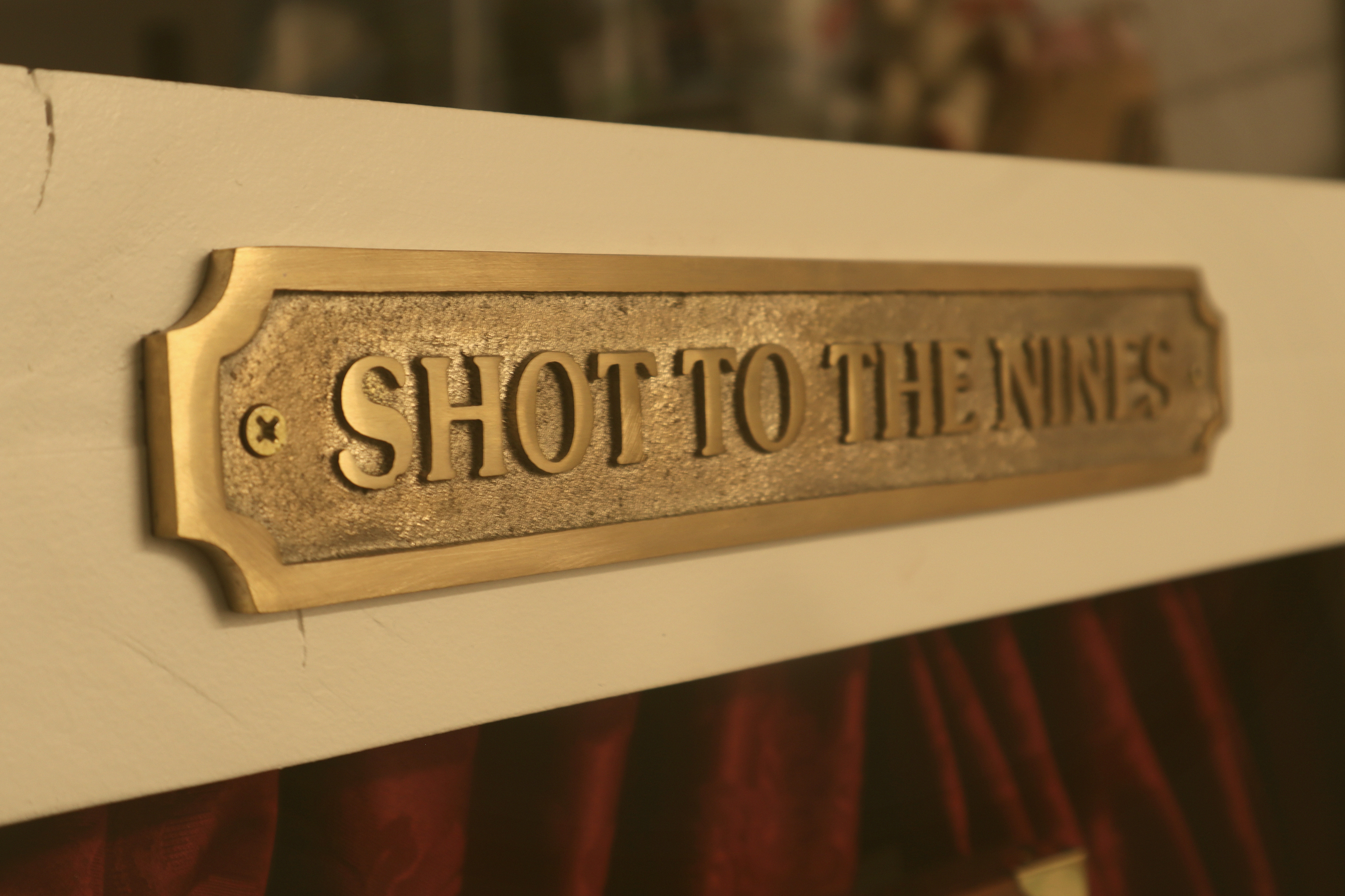 Shot to the Nines - Handcrafted Brass Nameplate